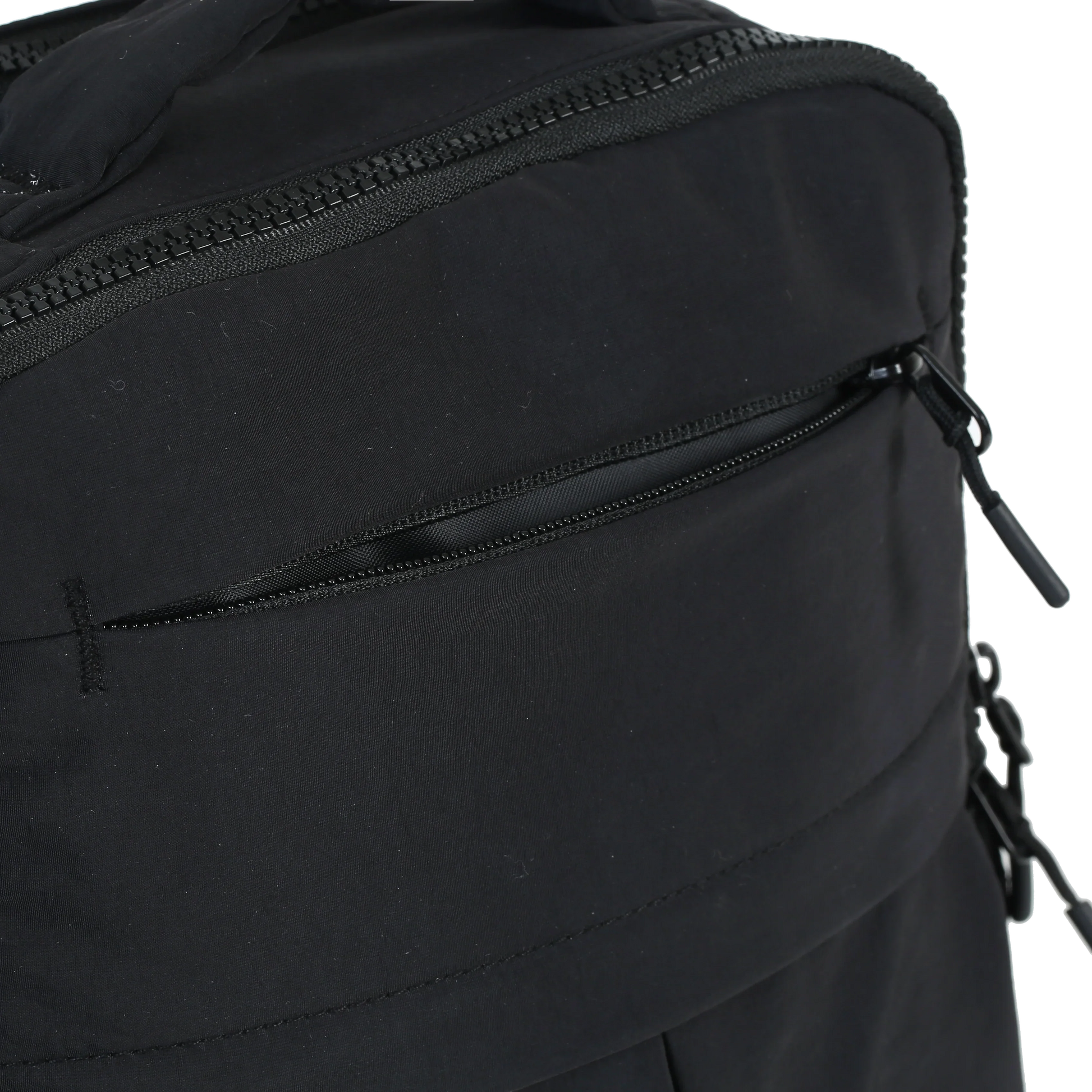 Minimax - The Roomiest Mini Backpack